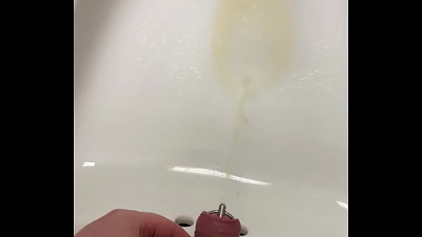 Me At Work With A Cock Plug Pissing In The Sink