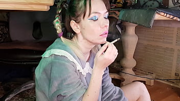 Young Mom Smokes A Cigarette