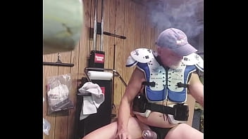 Coach Relaxing With Cigar And Pump