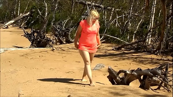 Sea And Island,relaxing On The Beach Of A Hot Blonde