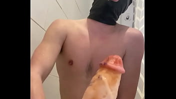 Slutty Teen Sucking Big Dildo