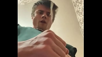 Guy In A Green T-shirt Jerks Off Cock And Cums