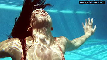 Kittina Submerges Herself In To The Hot Pool