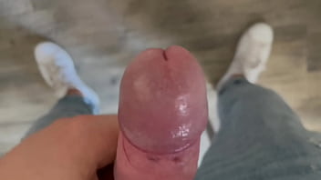 Young Guy Strokes His Big Cock Until Cumming On The Floor