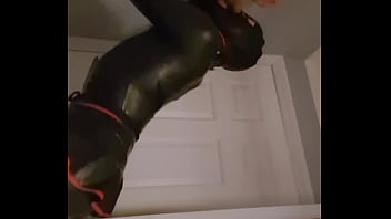 Latex Sissy And Two Dildos