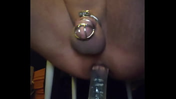 Riding Biggest Dildo In Chastity