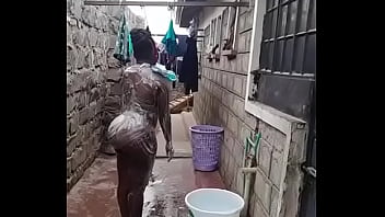 Naked Ebony Taking Shower Outside