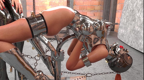 Slave In Metal Bondage