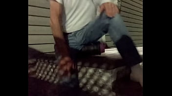 Stretching On Steps At Night With Jeans And T