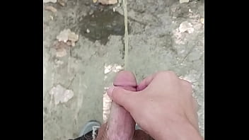 Pissing Outside In Creek