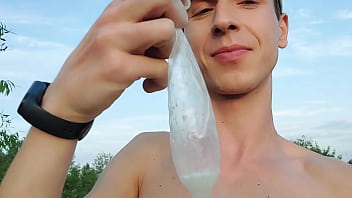 Twink Boy Found Again A Filled Up Condom While Nude Beach Cruising So He Put His Dick In It _ Loaded
