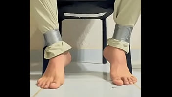 Casual Gay Man With His Feet Tape Tied (part 2)