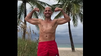 Flexing At Fort Lauderdale Beach - tan, fit, ripped, flexing, abs, beach-body, big-arms - Video 235328