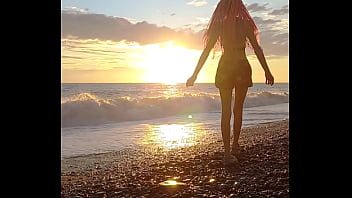 Sunset Girl At The Sea Beach