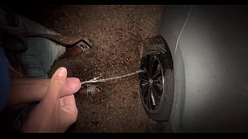 Pissing On Side Of Car Rim