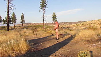 Naked Throwing A Log.