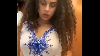 Busty Latina Stripteases