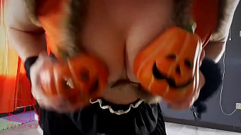 Halloween Witch In Rtgina Noir Witch With Pumpkins And A Broom. Regina Noir Velma Dinkley Yellow Pantyhose Performing In Old House At Stairway