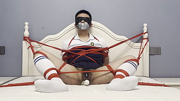 Asian Boy Tied To The Bed, Plugged By Dildo And Struggled