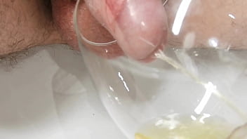 Filling A Glass With Hot Piss