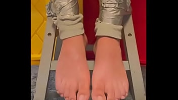 Chilean Gay Trainer With His Feet Tied With Adhesive Tape Struggling (001)