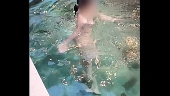 Beautiful Girl Taking Off Her Swimsuit At The Pool