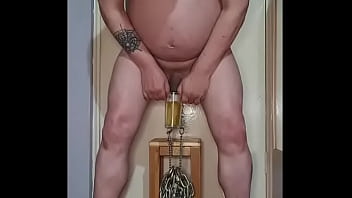 Hanging Heavy Chains From My Bullsacks With Nipple Clamps While Taking A Pee